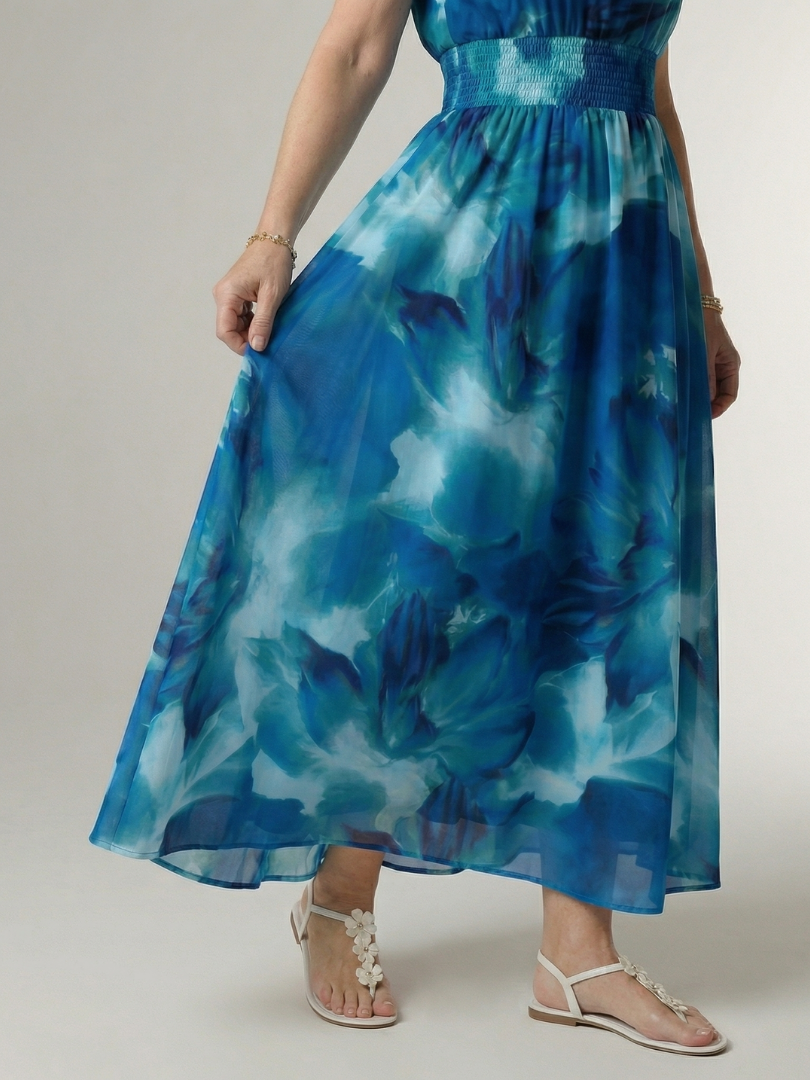 Sylin™ | Vestido midi fruncido con cuello halter