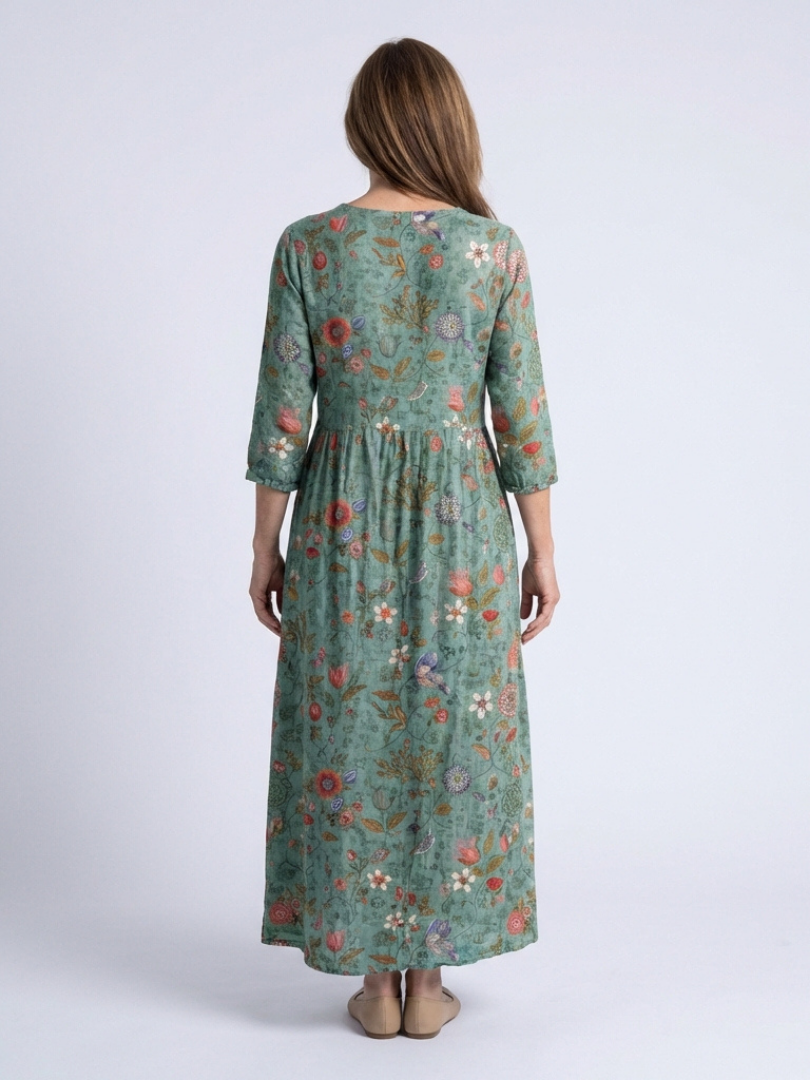 Marina™ | Vestido maxi floral con escote en V y mangas tres cuartos