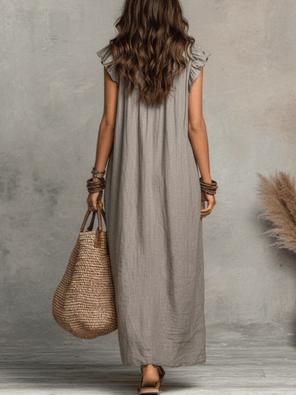 Vestido maxi bohemio sin mangas con escote en V y caída fluida