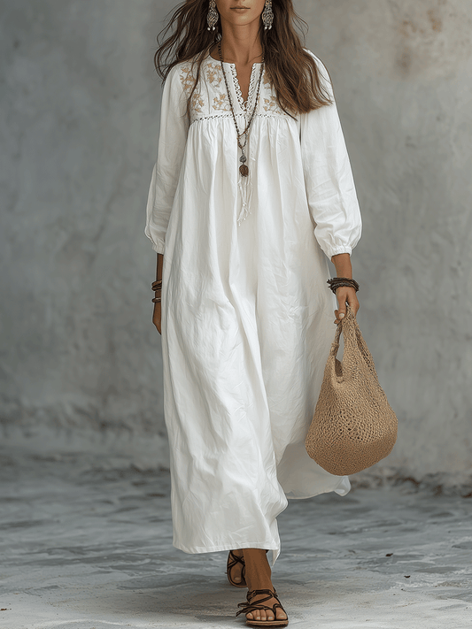 Vestido maxi blanco bohemio con bordado de flores y mangas globo