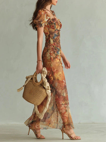 Marina | Vestido largo en chiffon naranja con estampado artístico estilo bohemio
